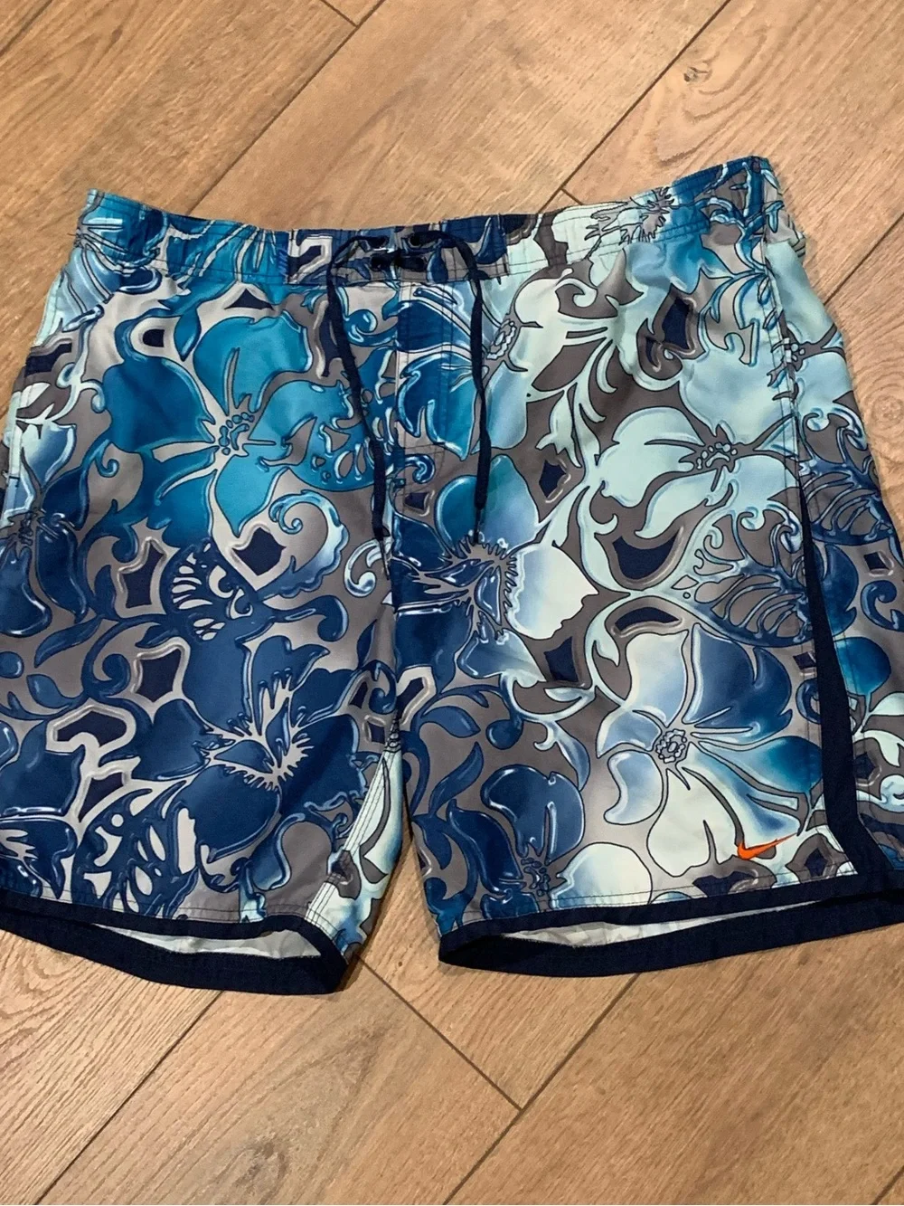 Nike Blue Floral Swim Trunks with Orange Swoosh
